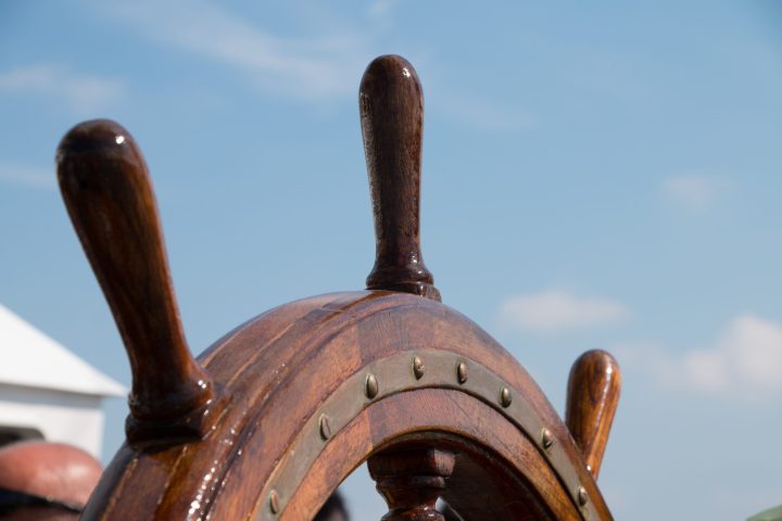 Ship,Rudder,,Sea,And,Blue,Sky,Background
